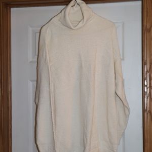 longer cream colored turtle neck sweater